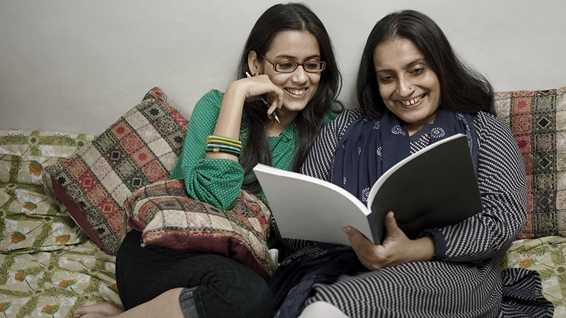 Diaspora Program - Women reading a book