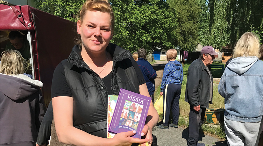 Ukrainian woman with Bible